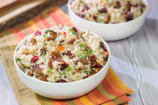 Packed with pecans, dried cranberries and carrots, this Pecan Rice Pilaf is a flavorful side dish for any season!