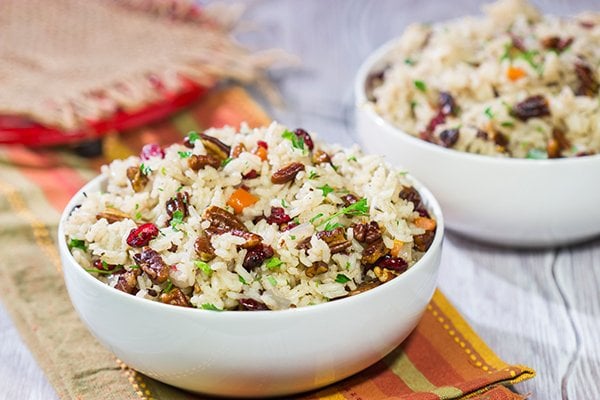 Packed with pecans, dried cranberries and carrots, this Pecan Rice Pilaf is a flavorful side dish for any season!