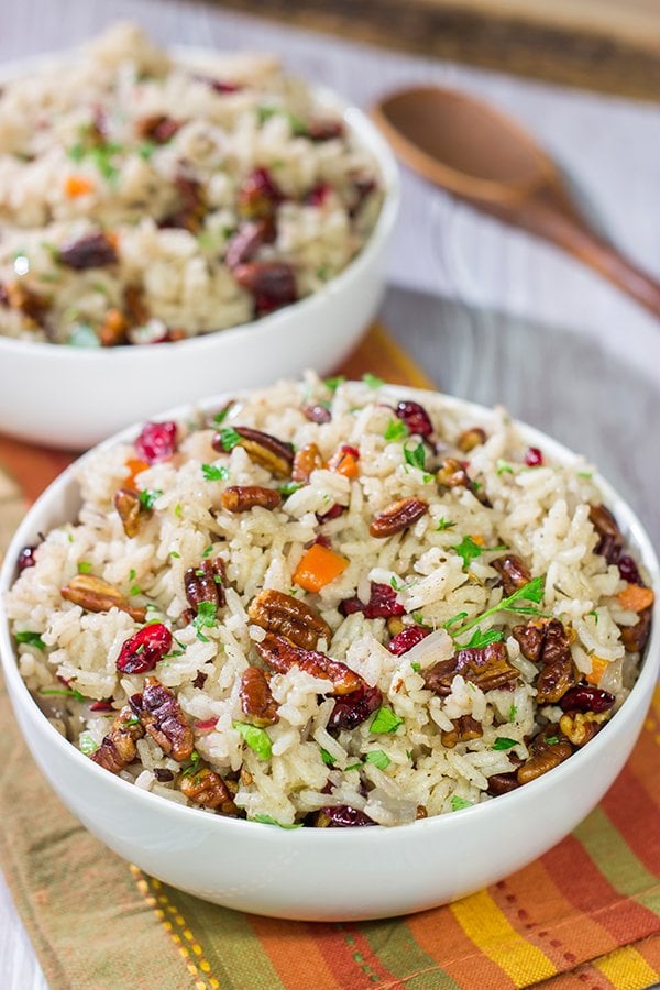 Packed with pecans, dried cranberries and carrots, this Pecan Rice Pilaf is a flavorful side dish for any season!