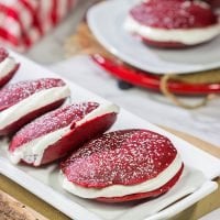 Put a red velvet spin on a classic baked treat!  These Red Velvet Whoopie Pies are filled with a marshmallow cream cheese frosting - they're delicious!