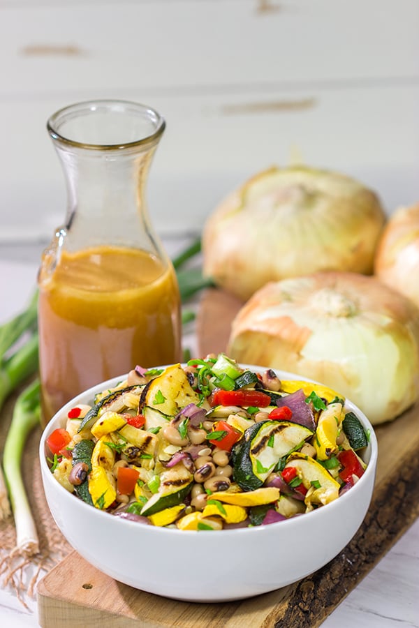If you're looking for a tasty summer side dish, then look no further!  This Vidalia Onion, Bourbon and Sorghum Vinaigrette with Black Eyed Pea Salad is packed with flavor!