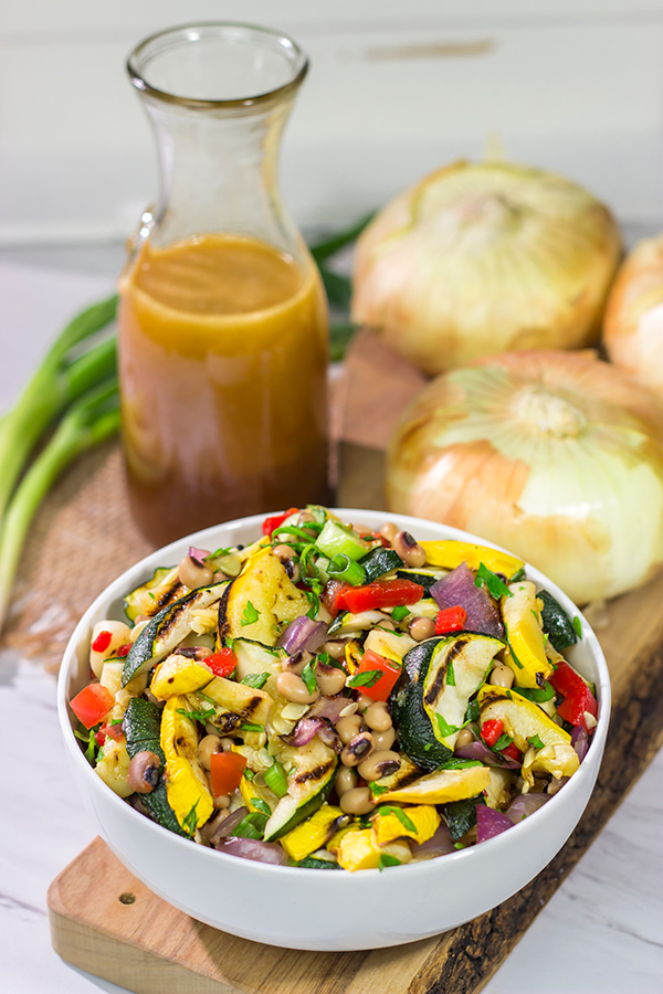 If you're looking for a tasty summer side dish, then look no further!  This Vidalia Onion, Bourbon and Sorghum Vinaigrette with Black Eyed Pea Salad is packed with flavor!