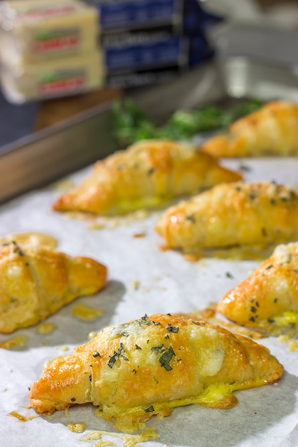 These Cheesy Crescent Rolls feature flaky layers filled with melted cheese...and they can be ready in just 20 minutes!