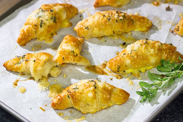 These Cheesy Crescent Rolls feature flaky layers filled with melted cheese...and they can be ready in just 20 minutes!