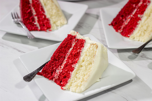 Looking for a fun red velvet dessert idea? Bake up this Red Velvet Ombre Cake! It's a tasty dessert with a unique 'wow' factor when you slice into it!