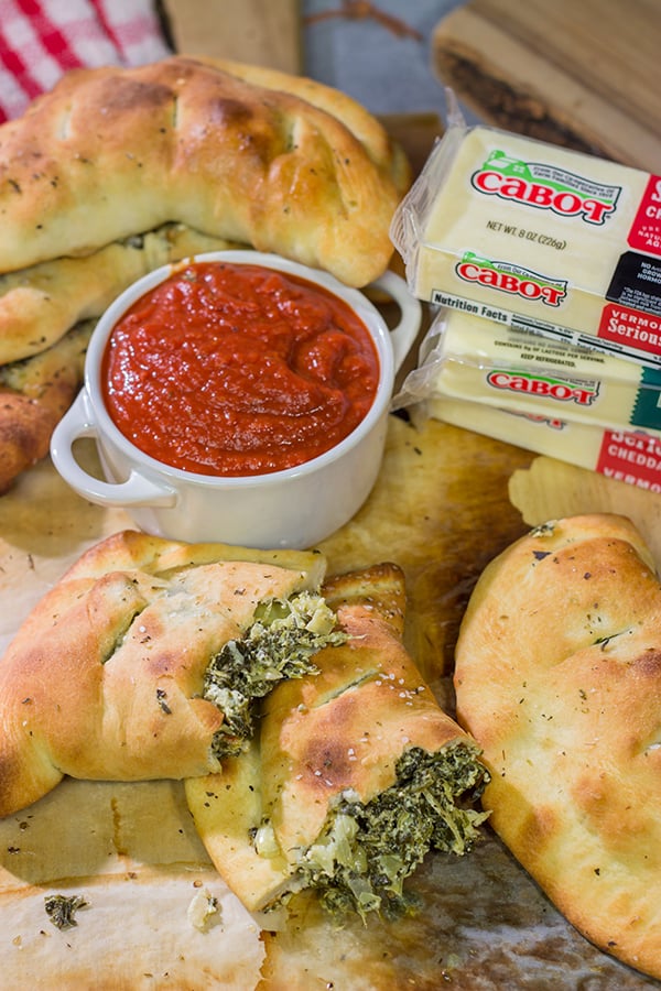 Turn a favorite dip into a meal with a batch of these Spinach Artichoke Calzones!