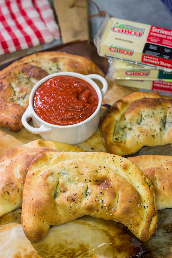 Turn a favorite dip into a meal with a batch of these Spinach Artichoke Calzones!