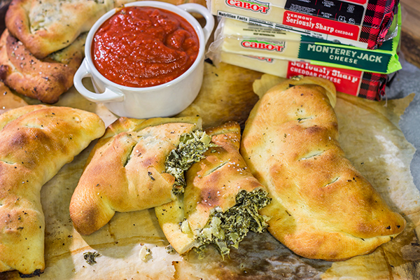 Turn a favorite dip into a meal with a batch of these Spinach Artichoke Calzones!