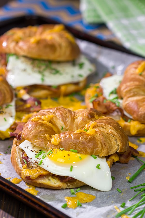 These Bacon and Egg Croissants are an easy and delicious breakfast or brunch recipe! Flaky croissants...melty cheese...crispy bacon...yum!