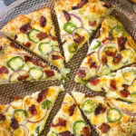 Love jalapeno poppers?  Then put this Jalapeno Popper Pizza on the menu!  It's a tasty way to mix up Friday night pizza night!