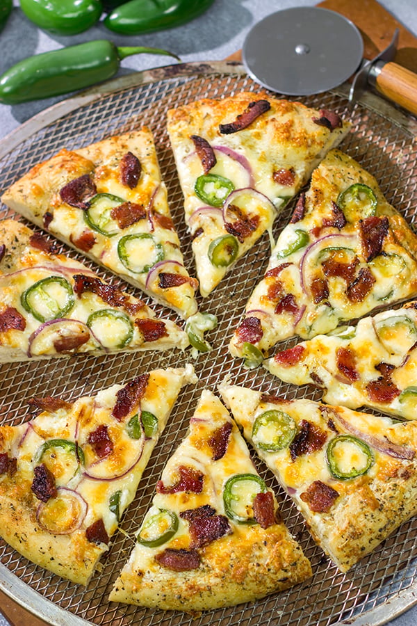 Love jalapeno poppers?  Then put this Jalapeno Popper Pizza on the menu!  It's a tasty way to mix up Friday night pizza night!