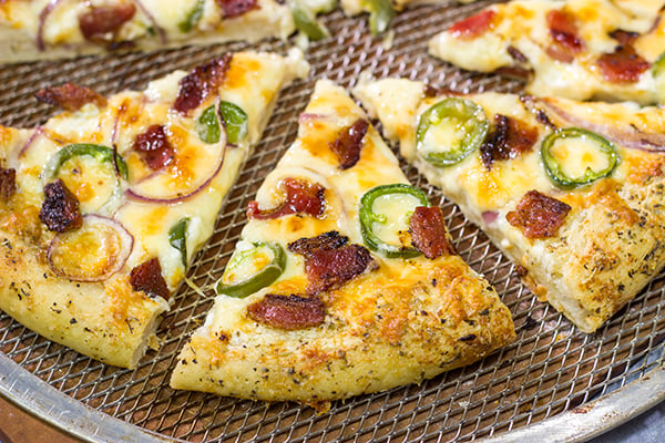 Love jalapeno poppers? Then put this Jalapeno Popper Pizza on the menu! It's a tasty way to mix up Friday night pizza night!