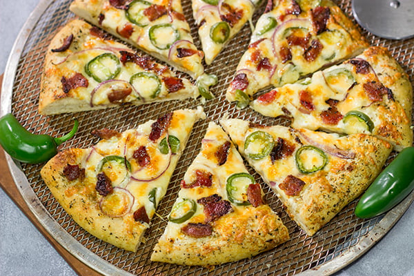 Love jalapeno poppers? Then put this Jalapeno Popper Pizza on the menu! It's a tasty way to mix up Friday night pizza night!