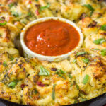 If you're looking for a fun twist on pizza night, then roll up a batch of these Chicken Pesto Pizza Rollups. They're packed with flavor, and they're sure to be a crowd favorite!