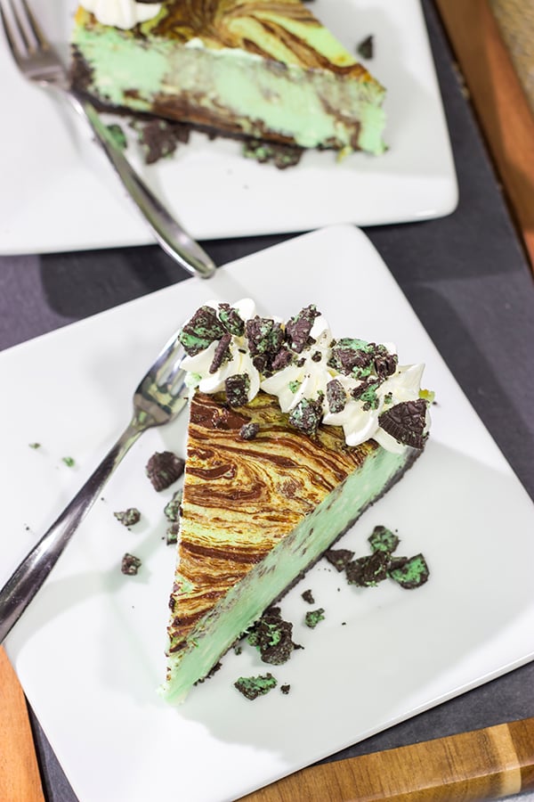 Based on the popular cocktail, this Chocolate Grasshopper Cheesecake features a mint chocolate filling on top of an Oreo crust. It's a delicious and unique dessert!