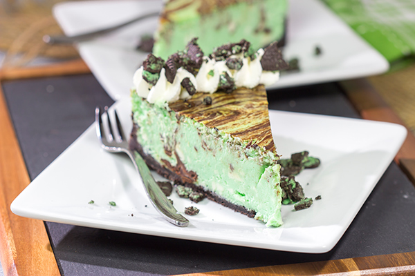 Based on the popular cocktail, this Chocolate Grasshopper Cheesecake features a mint chocolate filling on top of an Oreo crust. It's a delicious and unique dessert!
