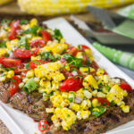 Fire up the grill! This Grilled Flank Steak with Charred Corn Salsa is a great recipe for summer dinners on the back porch!