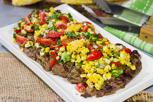Fire up the grill! This Grilled Flank Steak with Charred Corn Salsa is a great recipe for summer dinners on the back porch!