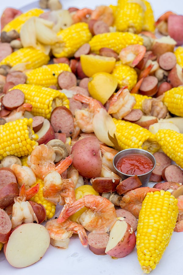 A Lowcountry Boil is a classic Southern recipe famous along the South Carolina coast. This combination of shrimp, sausage, corn and potatoes is ideal for a backyard party with friends!