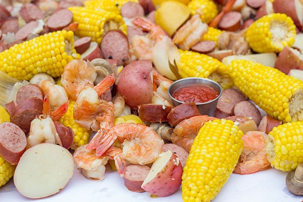 A Lowcountry Boil is a classic Southern recipe famous along the South Carolina coast. This combination of shrimp, sausage, corn and potatoes is ideal for a backyard party with friends!