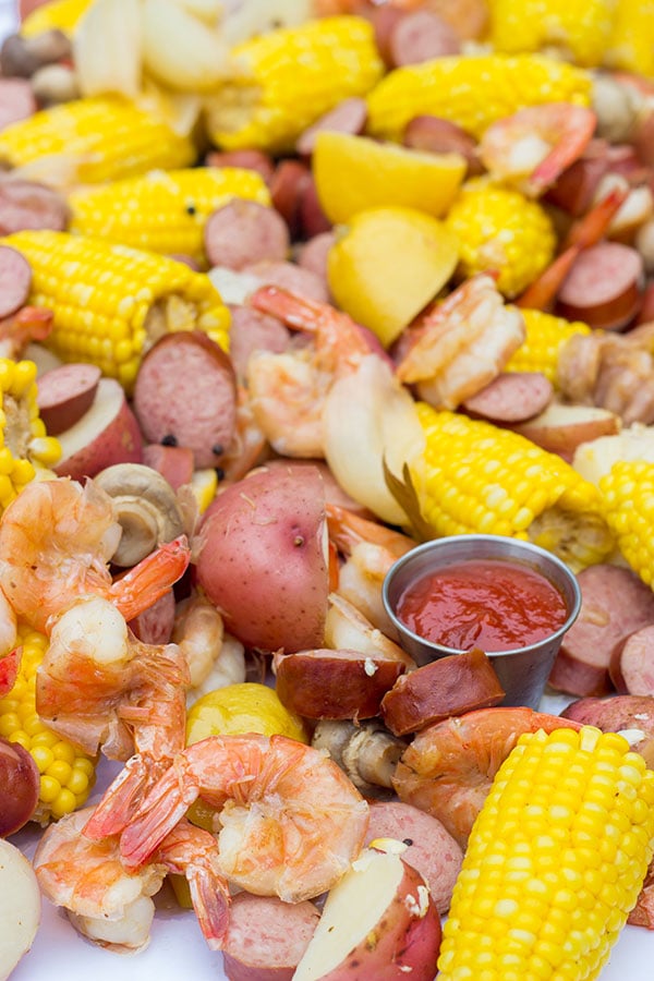 A Lowcountry Boil is a classic Southern recipe famous along the South Carolina coast. This combination of shrimp, sausage, corn and potatoes is ideal for a backyard party with friends!