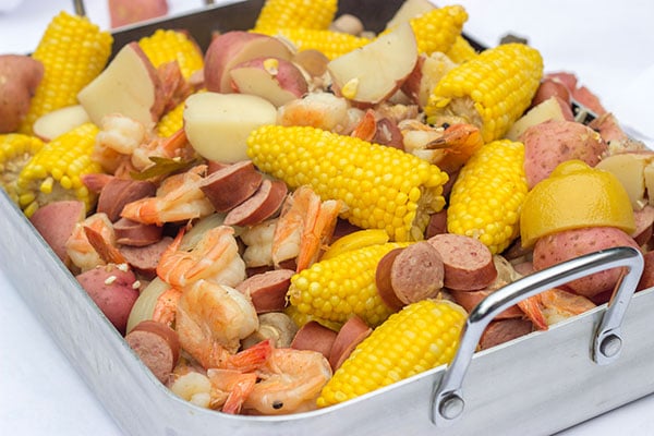 A Lowcountry Boil is a classic Southern recipe famous along the South Carolina coast. This combination of shrimp, sausage, corn and potatoes is ideal for a backyard party with friends!