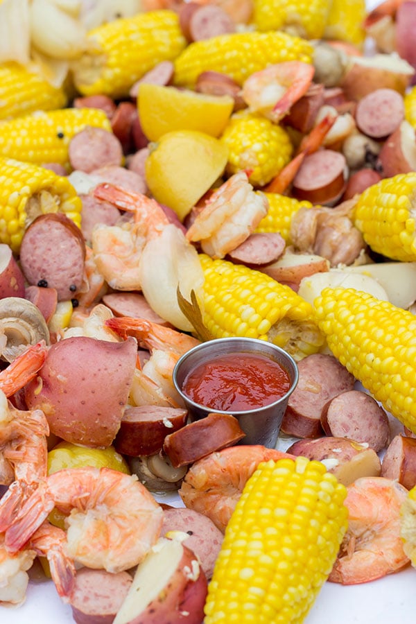A Lowcountry Boil is a classic Southern recipe famous along the South Carolina coast. This combination of shrimp, sausage, corn and potatoes is ideal for a backyard party with friends!
