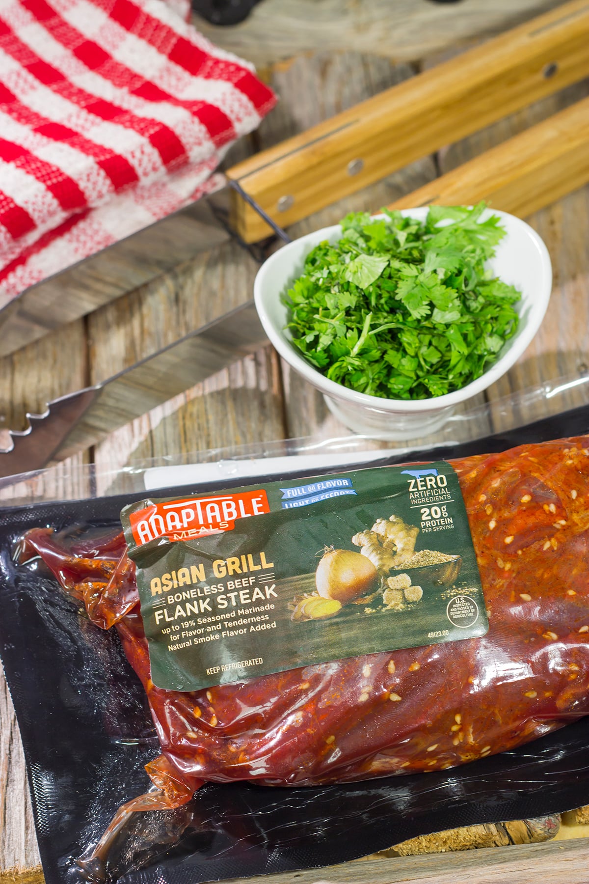 Featuring a flavorful, grilled flank steak served over a colorful salad, this Asian Steak Salad is an easy and tasty way to mix up the weeknight dinner routine!