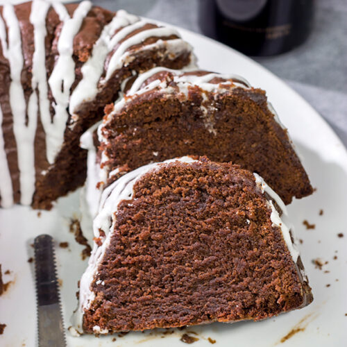 This Chocolate Pound Cake with Guinness Glaze features a moist, dense chocolate cake topped with a delicious drizzle of Guinness glaze. This recipe is perfect for St. Patrick's Day parties!