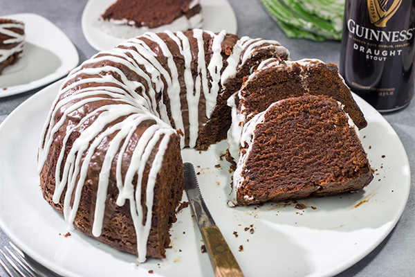 This Chocolate Pound Cake with Guinness Glaze features a moist, dense chocolate cake topped with a delicious drizzle of Guinness glaze. This recipe is perfect for St. Patrick's Day parties!