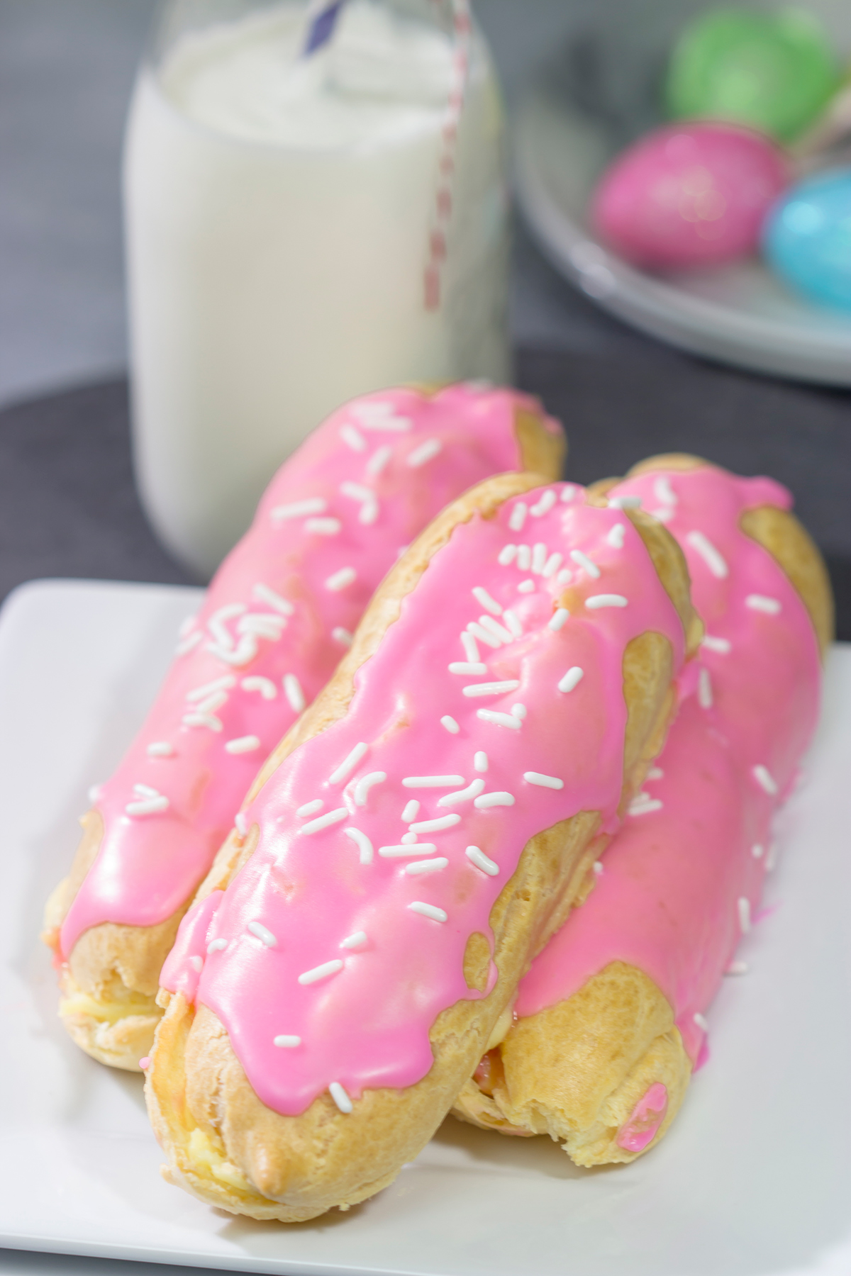 These Easter Eclairs feature a light, crispy shell filled with pastry cream and glazed with pink icing. They're a fun (and tasty!) way to celebrate the season!