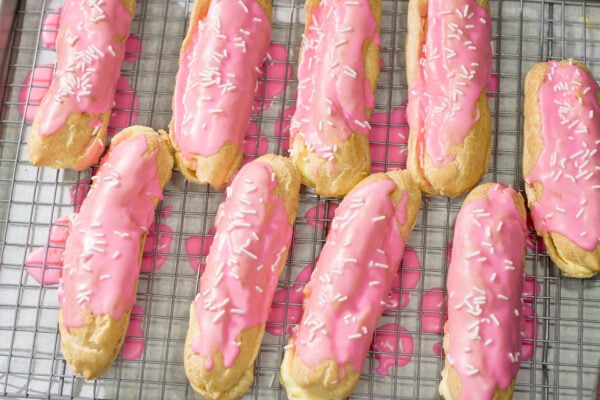 These Easter Eclairs feature a light, crispy shell filled with pastry cream and glazed with pink icing. They're a fun (and tasty!) way to celebrate the season!
