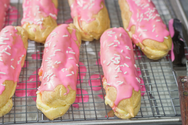 These Easter Eclairs feature a light, crispy shell filled with pastry cream and glazed with pink icing. They're a fun (and tasty!) way to celebrate the season!