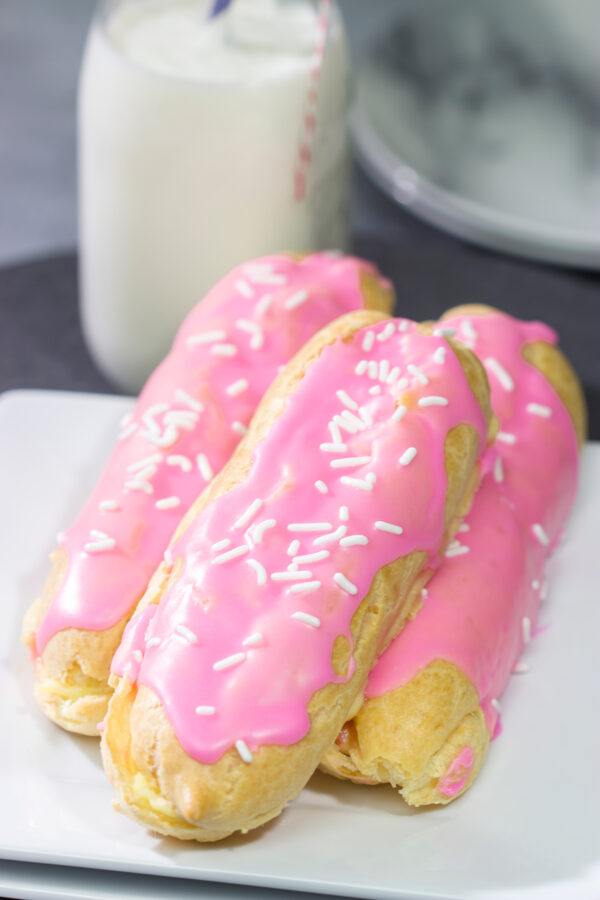 These Easter Eclairs feature a light, crispy shell filled with pastry cream and glazed with pink icing. They're a fun (and tasty!) way to celebrate the season!