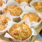 Filled with juicy peaches and topped with a brown sugar crumble, these Peach Streusel Muffins are a tasty treat for summer mornings!