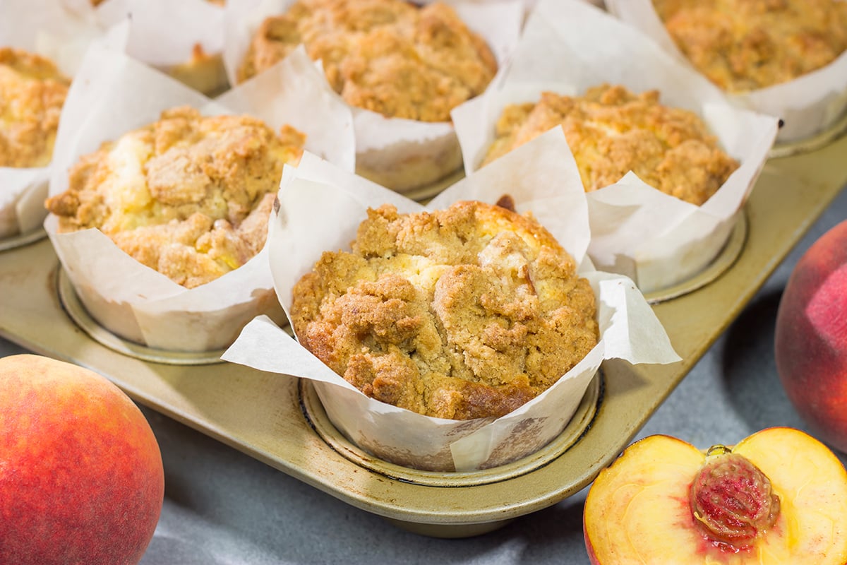 illed with juicy peaches and topped with a brown sugar crumble, these Peach Streusel Muffins are a tasty treat for summer mornings!