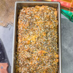 Filled with melted cheese and topped with everything bagel seasoning, this Cheesy Everything Bread is a great way to celebrate the return of baking season!