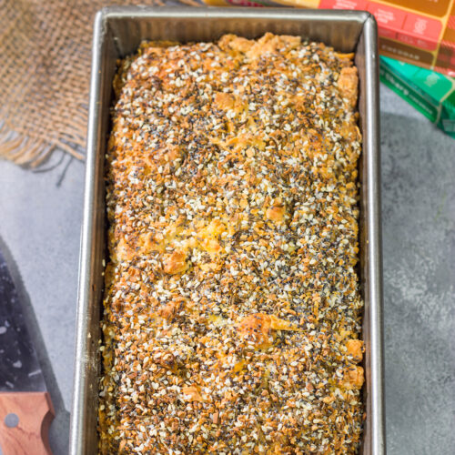 Filled with melted cheese and topped with everything bagel seasoning, this Cheesy Everything Bread is a great way to celebrate the return of baking season!