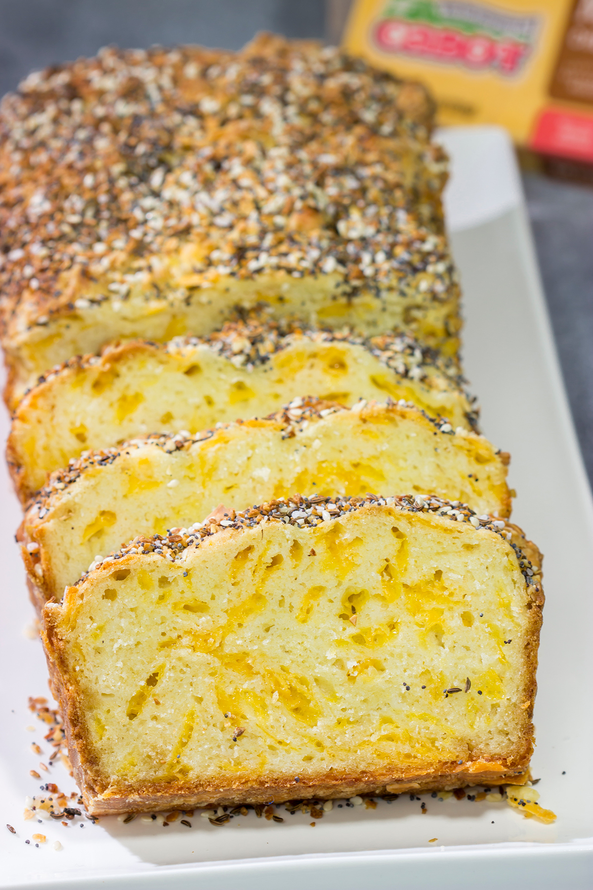 Filled with melted cheese and topped with everything bagel seasoning, this Cheesy Everything Bread is a great way to celebrate the return of baking season!