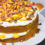 Featuring freshly grated ginger in both the cake as well as the frosting, this Peach Ginger Cake makes for a tasty dessert on a warm summer evening!