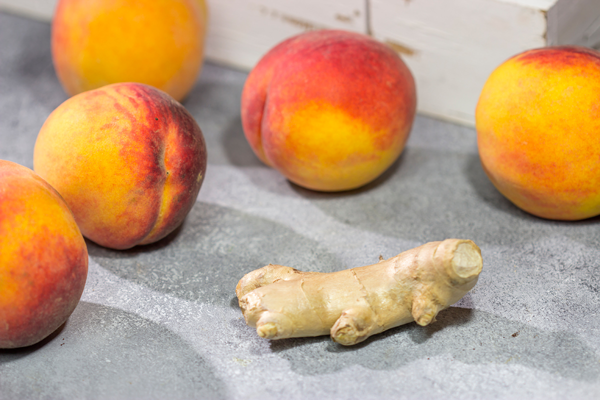 Featuring freshly grated ginger in both the cake as well as the frosting, this Peach Ginger Cake makes for a tasty dessert on a warm summer evening!