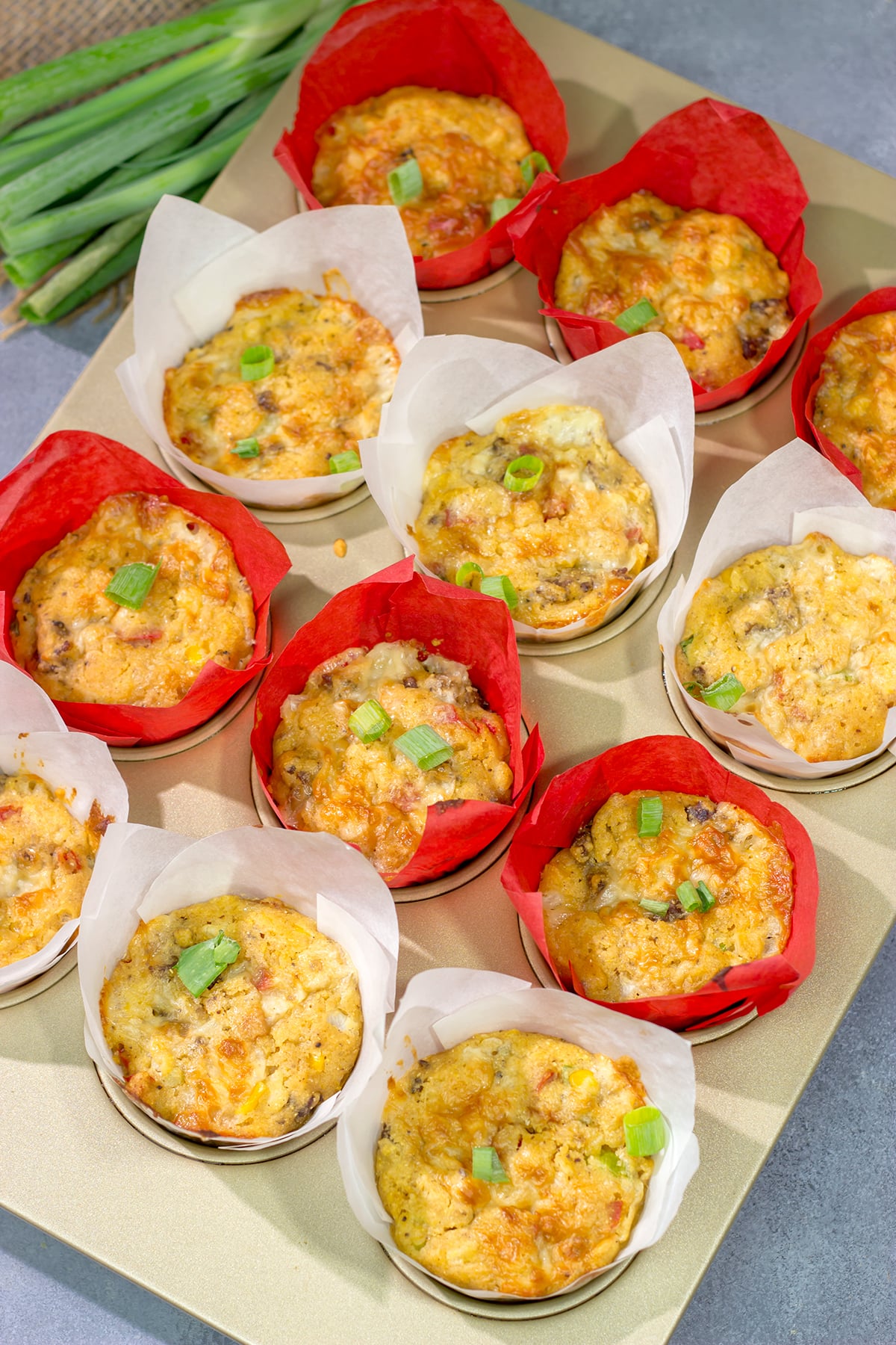 Packed with cheddar cheese and Italian sausage, these Sausage and Cheese Cornbread Muffins are a great side dish next to a hot bowl of chili or soup!