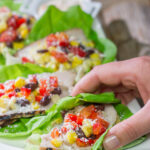 Filled with thinly sliced, marinated pork loin, grilled corn and chopped peppers, these Southwest Pork Lettuce Wraps make for a tasty gameday appetizer or meal!