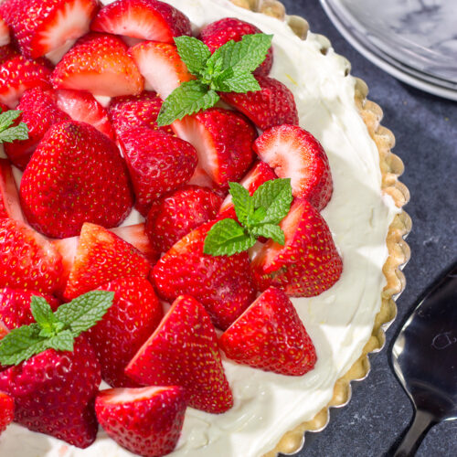 Featuring a creamy cheesecake filling over a shortbread cookie crust, this Strawberry Cheesecake Tart is a great way to highlight the flavor of fresh, juicy strawberries!
