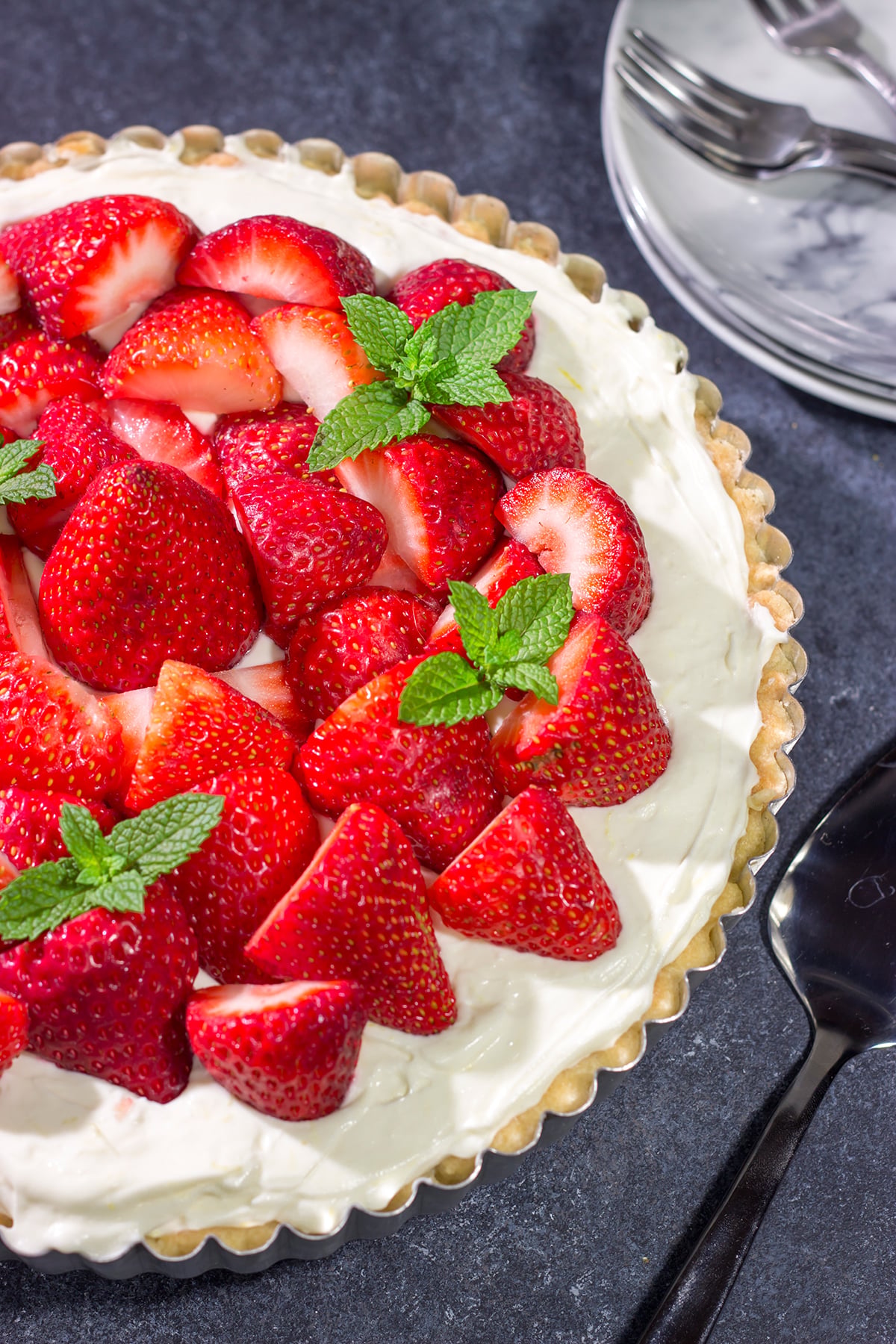 Featuring a creamy cheesecake filling over a shortbread cookie crust, this Strawberry Cheesecake Tart is a great way to highlight the flavor of fresh, juicy strawberries!