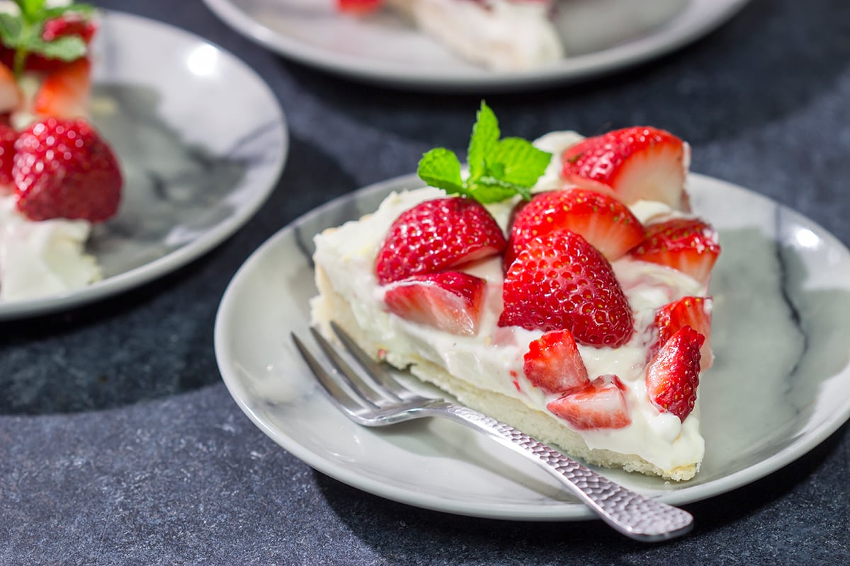 Featuring a creamy cheesecake filling over a shortbread cookie crust, this Strawberry Cheesecake Tart is a great way to highlight the flavor of fresh, juicy strawberries!
