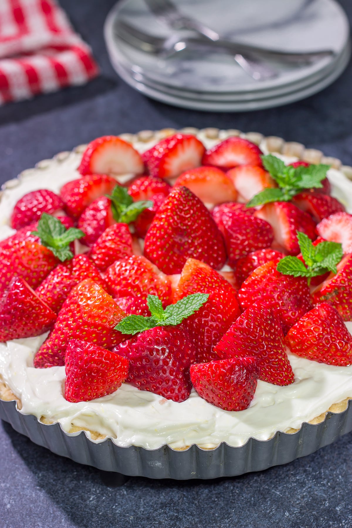 Featuring a creamy cheesecake filling over a shortbread cookie crust, this Strawberry Cheesecake Tart is a great way to highlight the flavor of fresh, juicy strawberries!