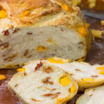 Packed with crumbled bacon and cubes of cheddar cheese, this no-knead Bacon Cheddar Bread is a fantastic way to enjoy fresh bread at home!