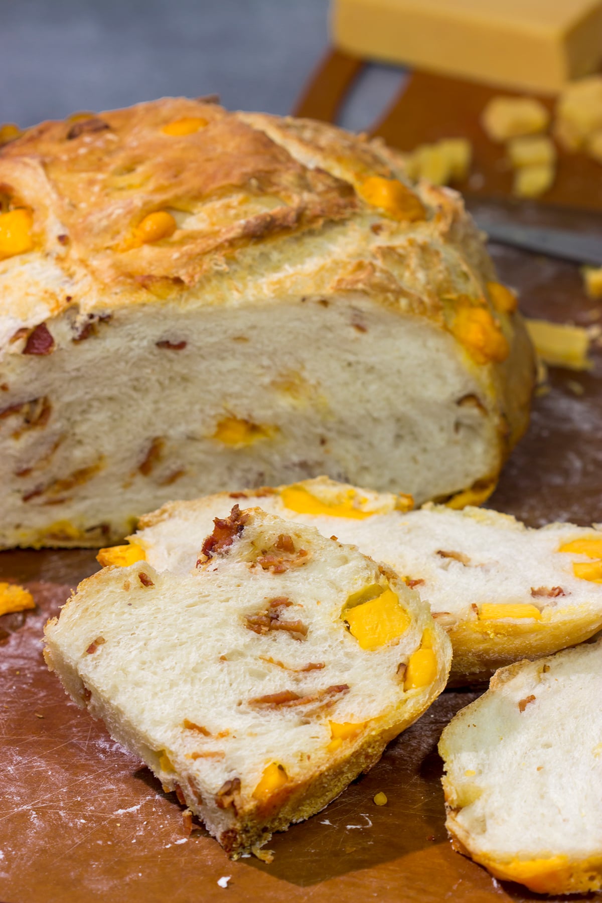 Packed with crumbled bacon and cubes of cheddar cheese, this no-knead Bacon Cheddar Bread is a fantastic way to enjoy fresh bread at home!