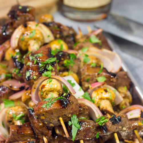 These Bourbon Steak Kabobs feature marinated sirloin steak, mushrooms and red onions on skewers. The grilled flavor of these kabobs is fantastic!